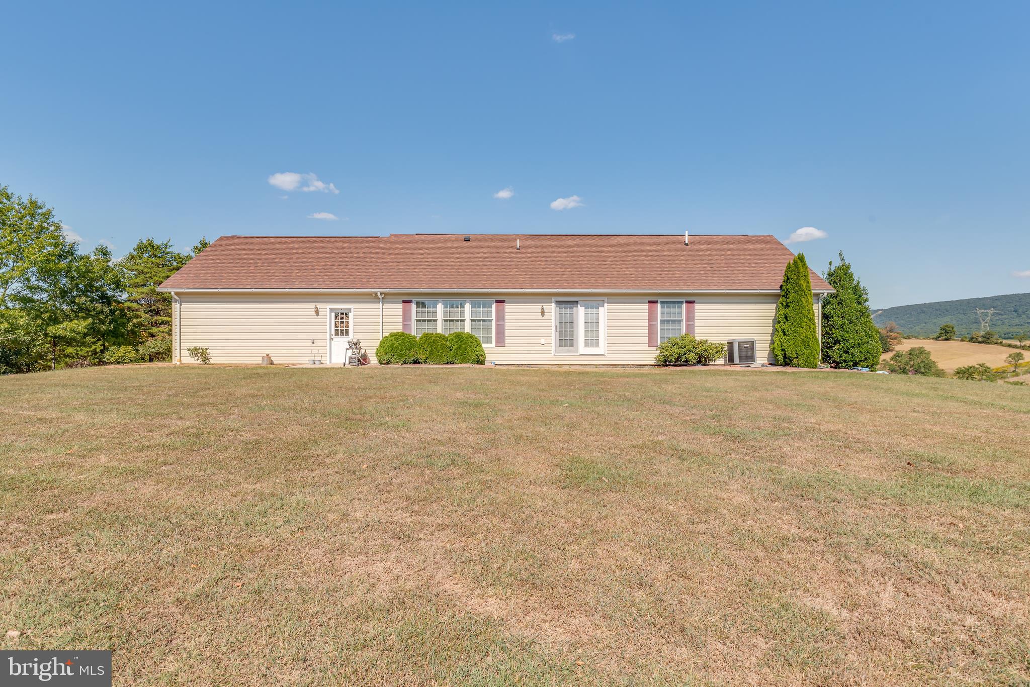 1296 Spielman Road Berkeley Springs, WV 25411 - Photo 53 of 68 Rear view showcases the large windows of the home