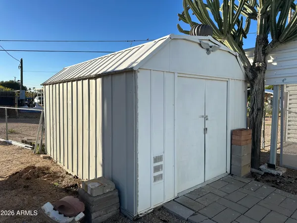a house view with a backyard space