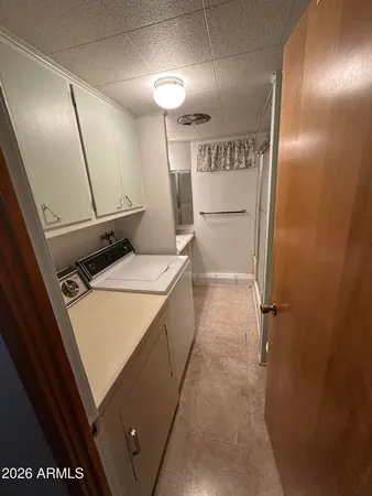 a storage room with washer and dryer