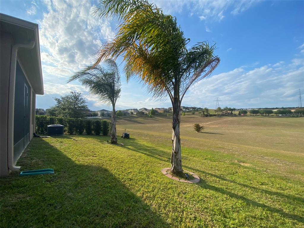 7047 Oxbow Road Minneola, FL 34715 - Photo 26 of 33 a view of a ocean with a big yard