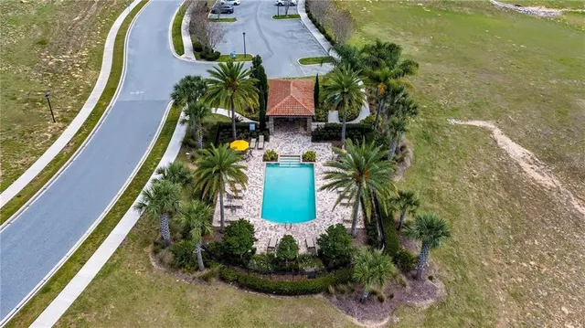 an aerial view of a swimming pool