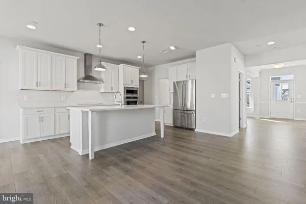 a view of kitchen with wooden floor