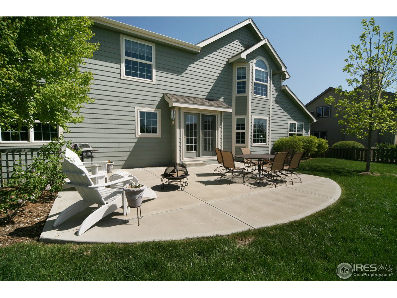 3147 Rookery Road Fort Collins, CO 80528 - Photo 17 of 18 a view of a house with backyard and sitting area