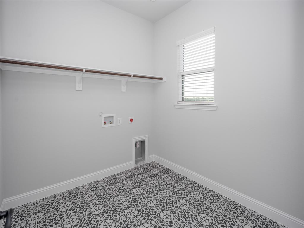 2108 Charters Circle Nevada, TX 75173 - Photo 17 of 37 Laundry room featuring washer hookup and electric dryer hookup