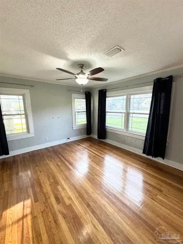 a view of an empty room and window