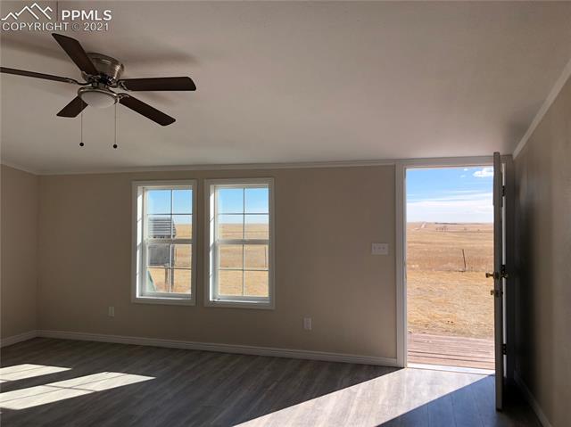 34755 Big Springs Road Yoder, CO 80864 - Photo 4 of 6 Living Room Overlooks Horse Pasture