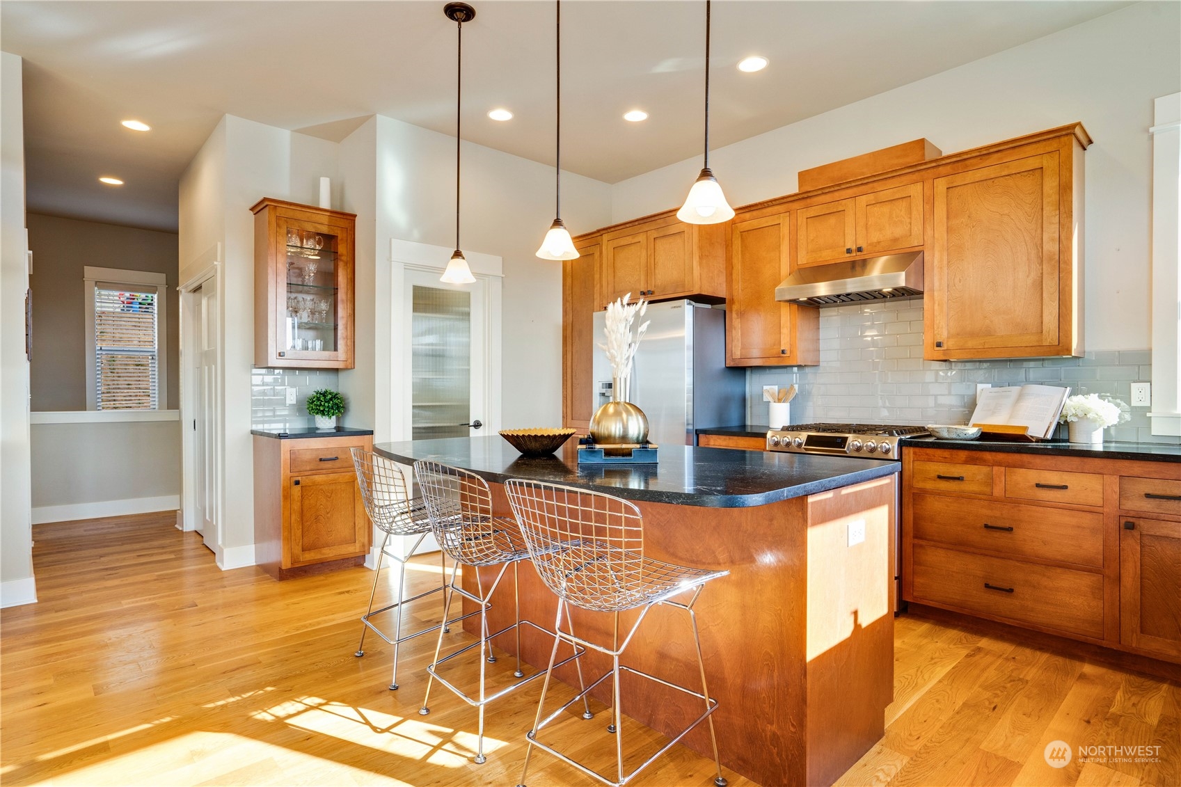 622 North Fernside Drive Tacoma, WA 98406 - Photo 11 of 40 a kitchen with stainless steel appliances kitchen island granite countertop a stove a sink and cabinets