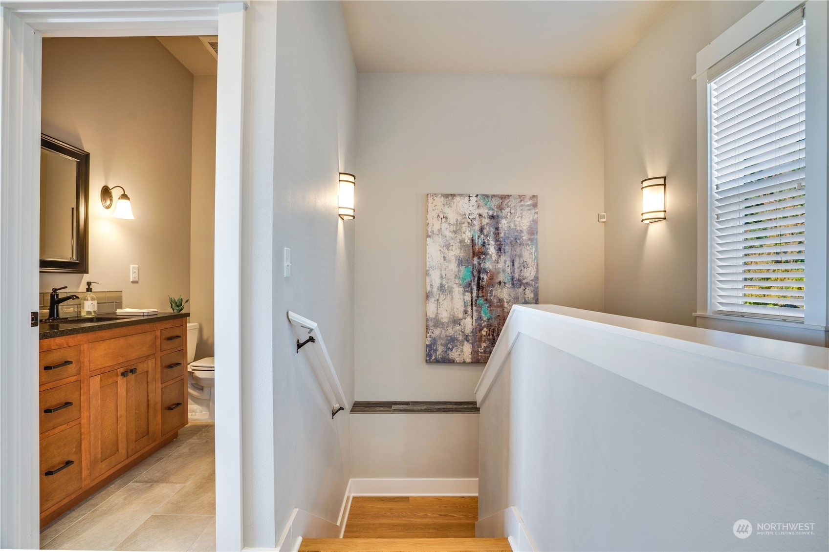 622 North Fernside Drive Tacoma, WA 98406 - Photo 27 of 40 a bathroom with a granite countertop shower a sink and a mirror