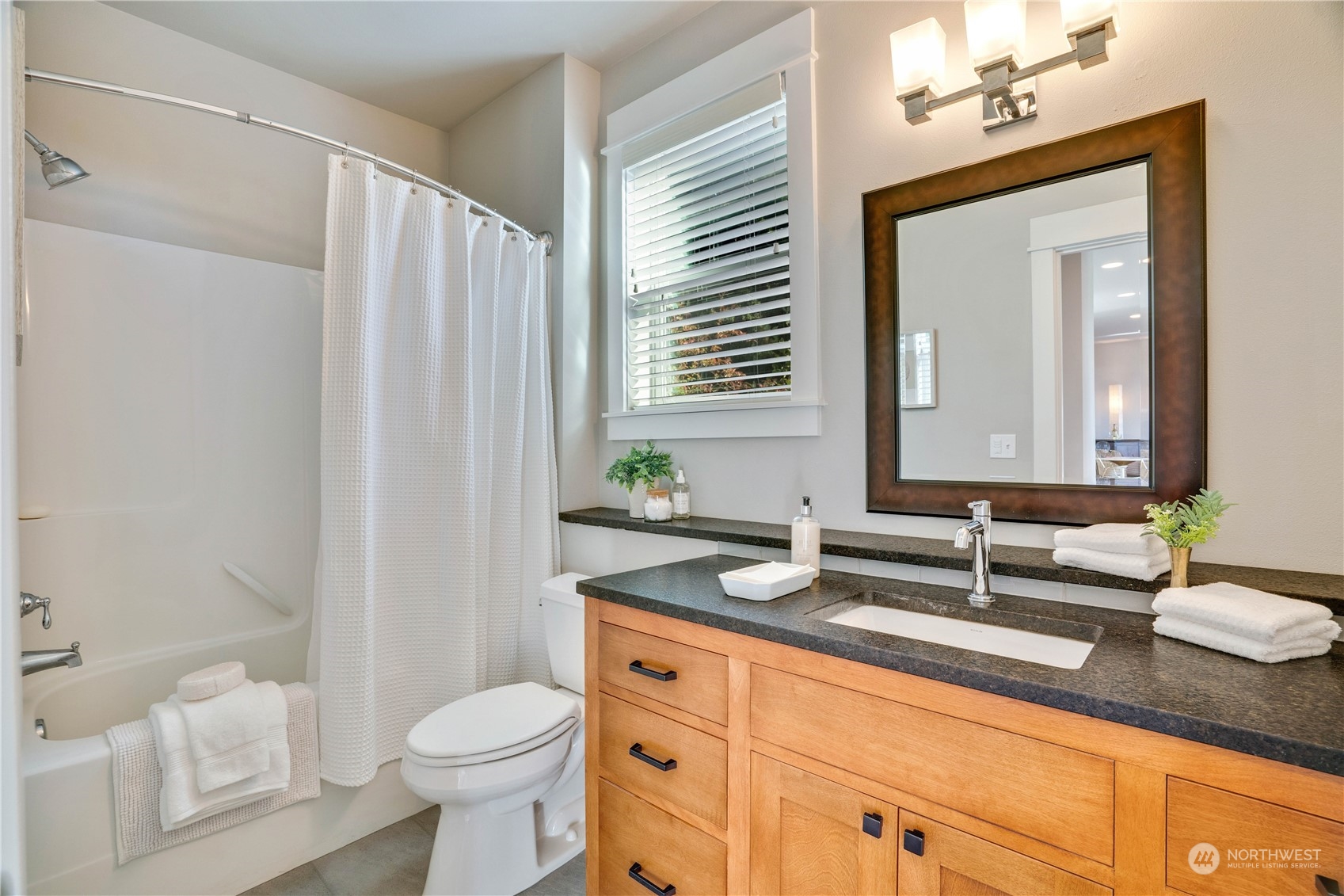 622 North Fernside Drive Tacoma, WA 98406 - Photo 33 of 40 a bathroom with a granite countertop sink toilet and shower