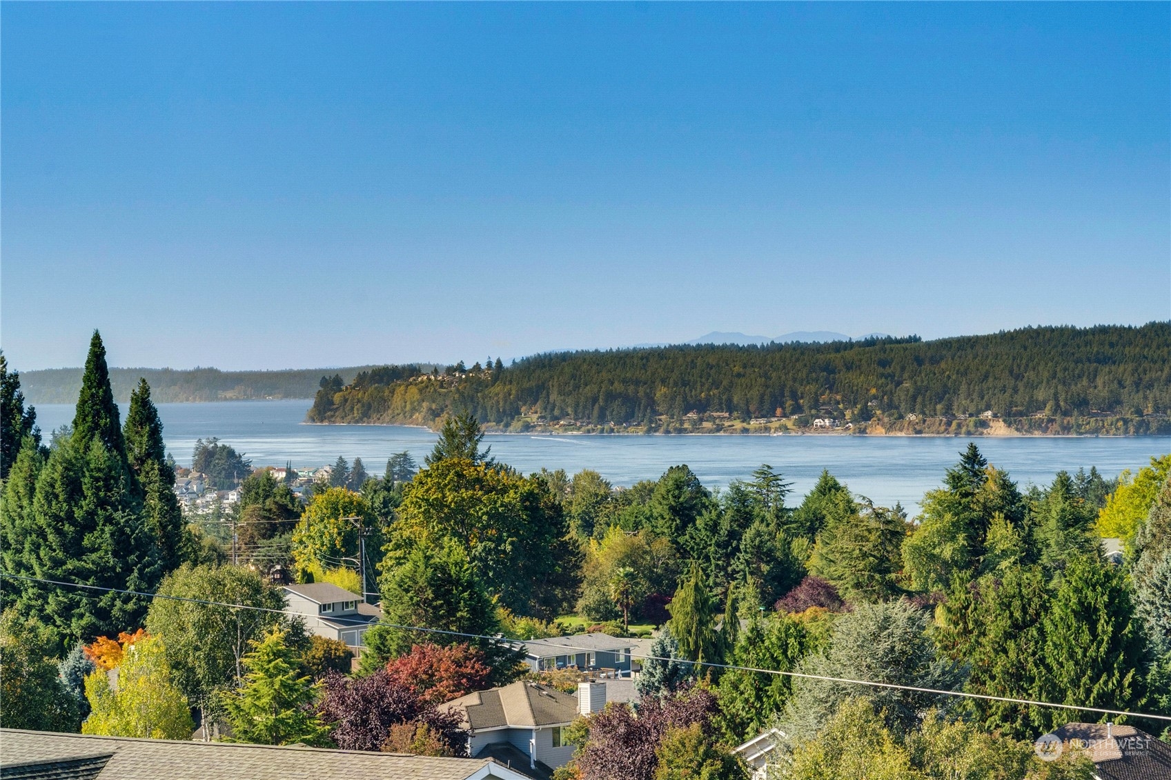 622 North Fernside Drive Tacoma, WA 98406 - Photo 6 of 40 a view of a lake with houses in the back