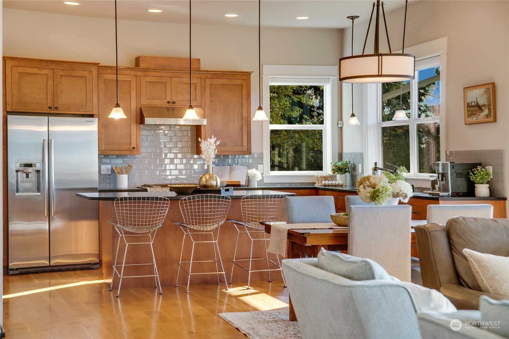 622 North Fernside Drive Tacoma, WA 98406 - Photo 7 of 40 a kitchen with stainless steel appliances granite countertop a refrigerator a sink a stove and white cabinets