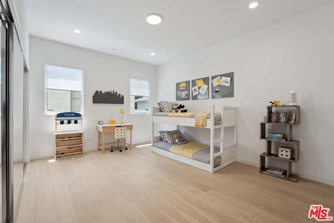 1746 Garfield Place, Unit 202 Los Angeles, CA 90028 - Photo 10 of 30 a room with furniture and white walls