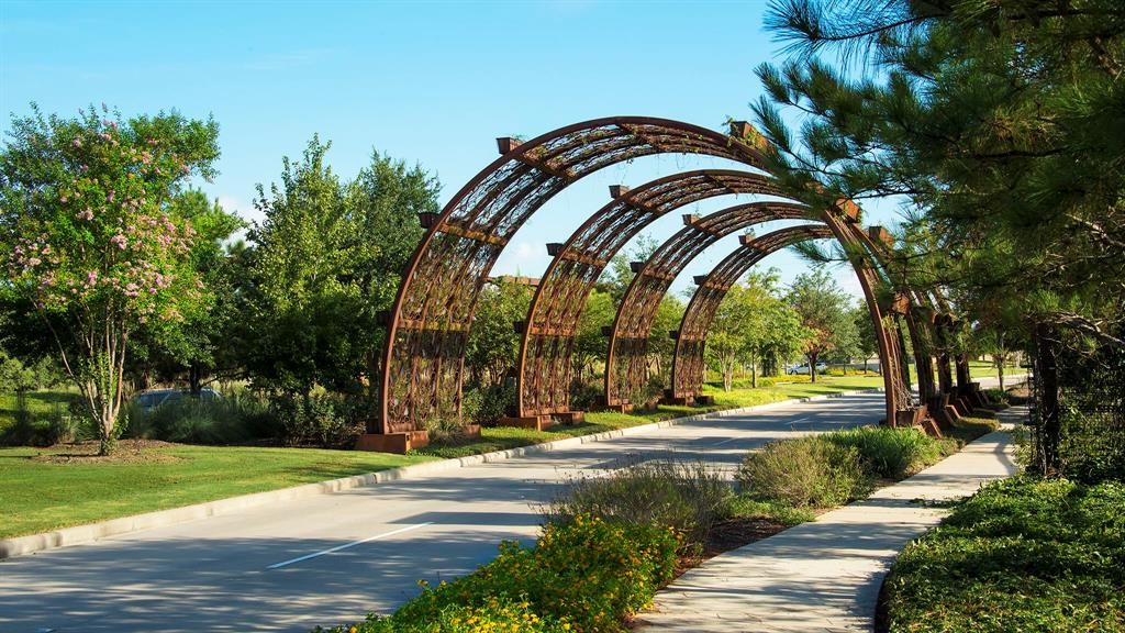 1703 Rosings Way Katy, TX 77493 - Photo 47 of 50 After driving onto Cane Island Parkway, you will come upon the Living Arches which will greet you as you enter Cane Island. The arches feature various plants that are native to the Katy, Texas area. Come and see the beautiful arches that greet you into Cane Island.