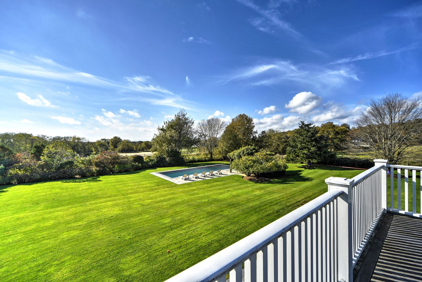 369 Town Lane Amagansett, NY 11930 - Photo 13 of 17 a view of a golf course with a lake