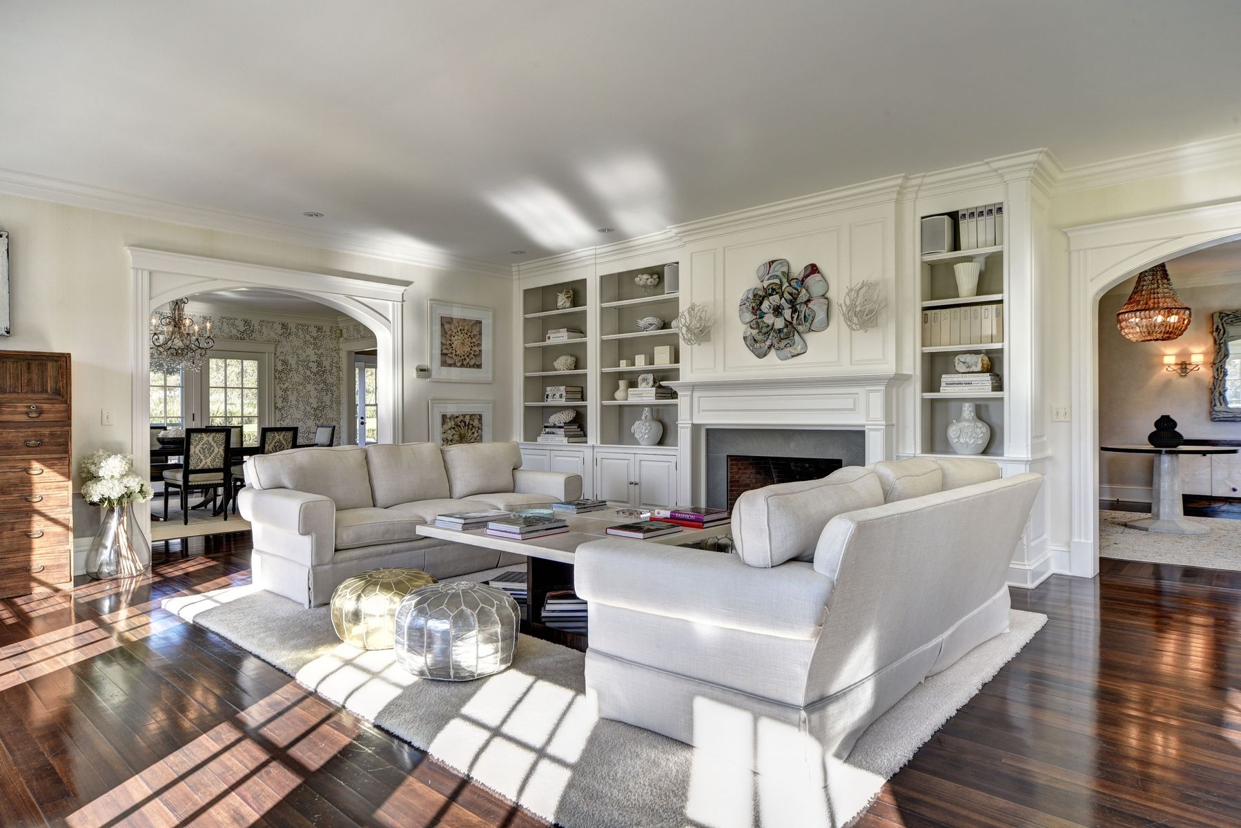 369 Town Lane Amagansett, NY 11930 - Photo 4 of 17 a living room with furniture large window and fireplace
