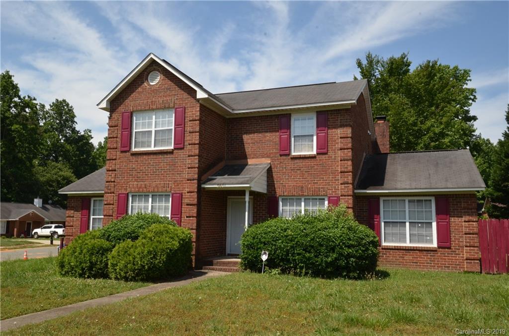 5601 Sunpath Circle Charlotte, NC 28269 - Photo 2 of 15 a front view of a house with a yard
