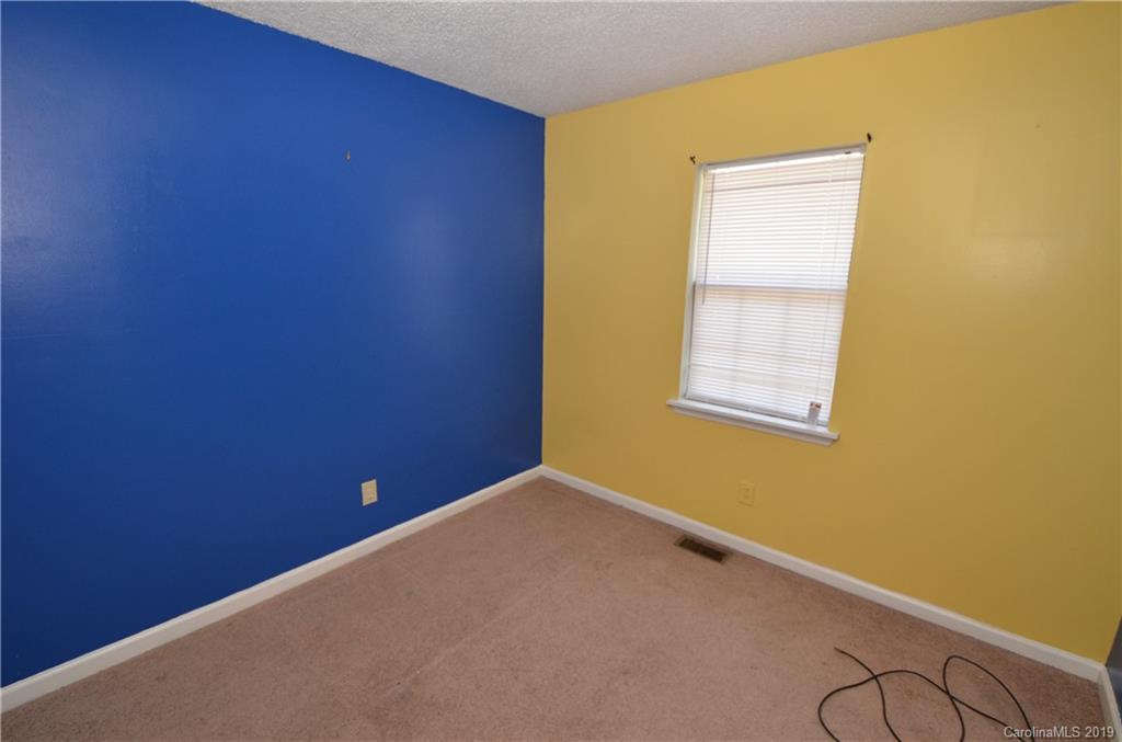 5601 Sunpath Circle Charlotte, NC 28269 - Photo 13 of 15 a view of an empty room with a window