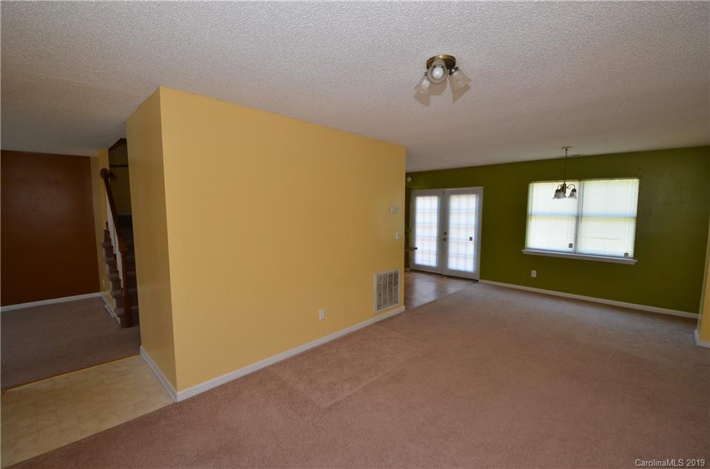 5601 Sunpath Circle Charlotte, NC 28269 - Photo 8 of 15 a view of an empty room with a window