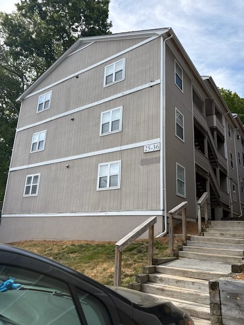 229 East King Street, Unit 31 Boone, NC 28607 - Photo 7 of 26 a front view of a house with street
