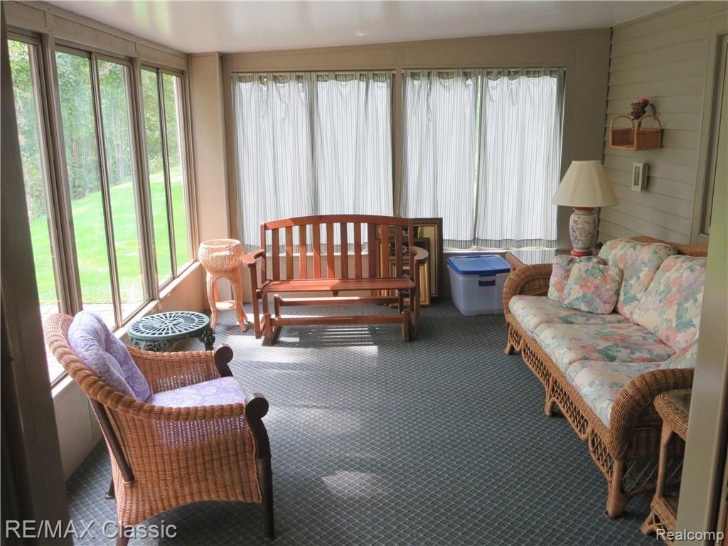 3092 Rivers Edge Drive Wayne, MI 48184 - Photo 30 of 40 Florida Room with surround windows and overlooking the wooded ravine.