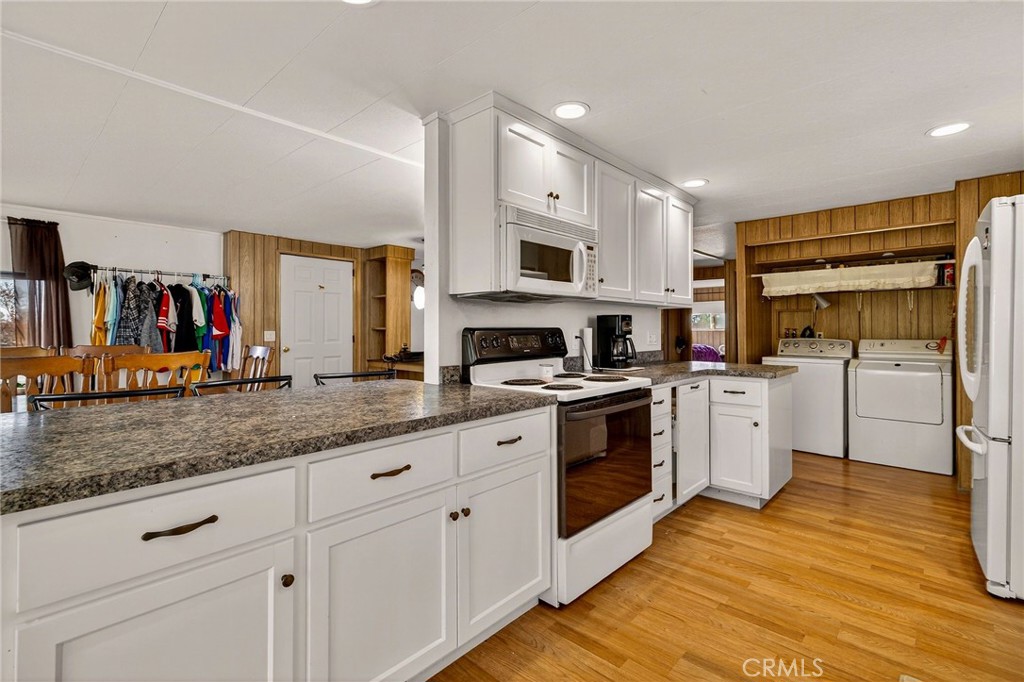 4783 County Road East Orland, CA 95963 - Photo 11 of 73 a kitchen with stainless steel appliances granite countertop a stove and a sink