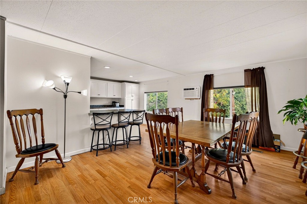 4783 County Road East Orland, CA 95963 - Photo 15 of 73 a view of a dining room with furniture window and wooden floor