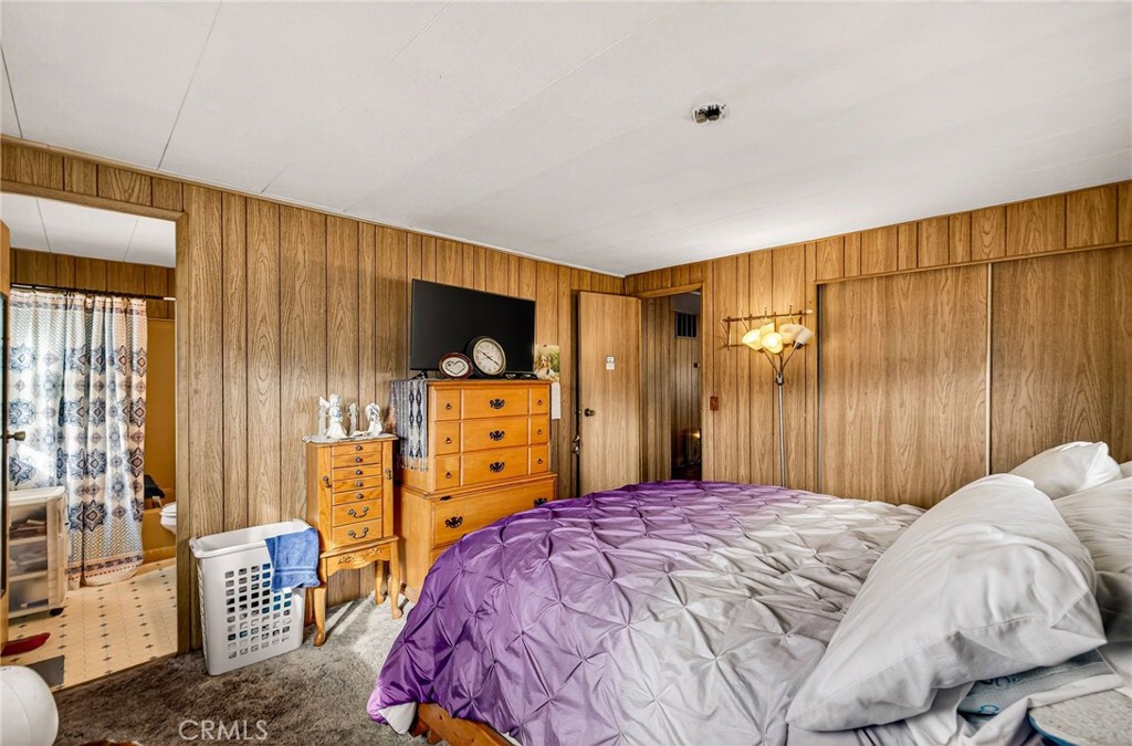 4783 County Road East Orland, CA 95963 - Photo 23 of 73 a bedroom with a bed and a television