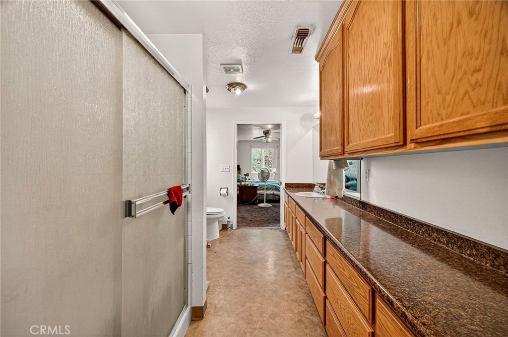 4783 County Road East Orland, CA 95963 - Photo 40 of 73 a kitchen with a refrigerator and a sink