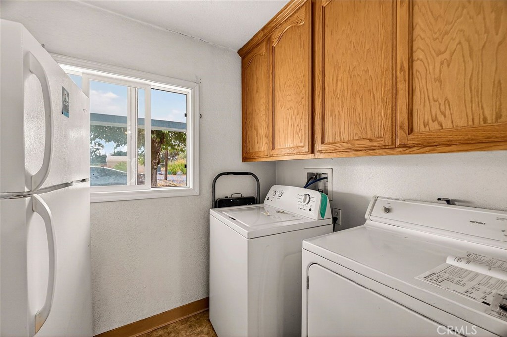 4783 County Road East Orland, CA 95963 - Photo 41 of 73 a view of storage and utility room with washer and dryer
