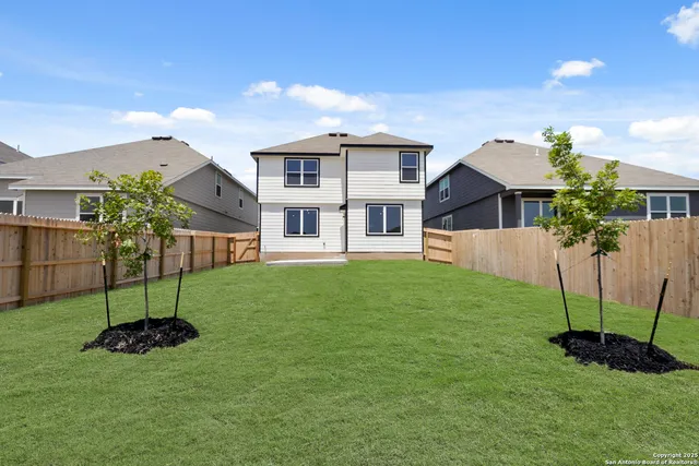 a view of a swimming pool with an ocean view