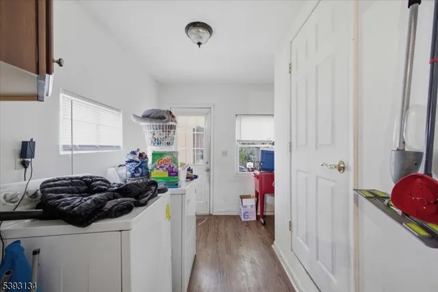 a kitchen with a refrigerator and a stove