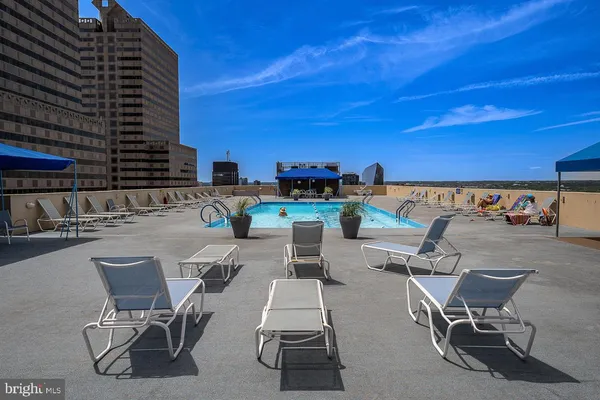 a view of a chairs and table in the patio
