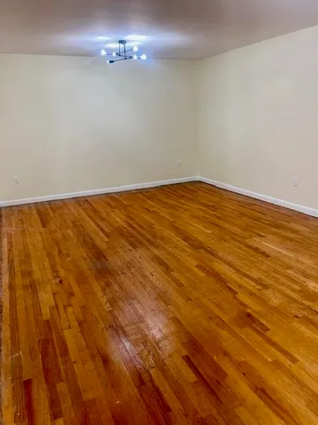 a view of a door and a window