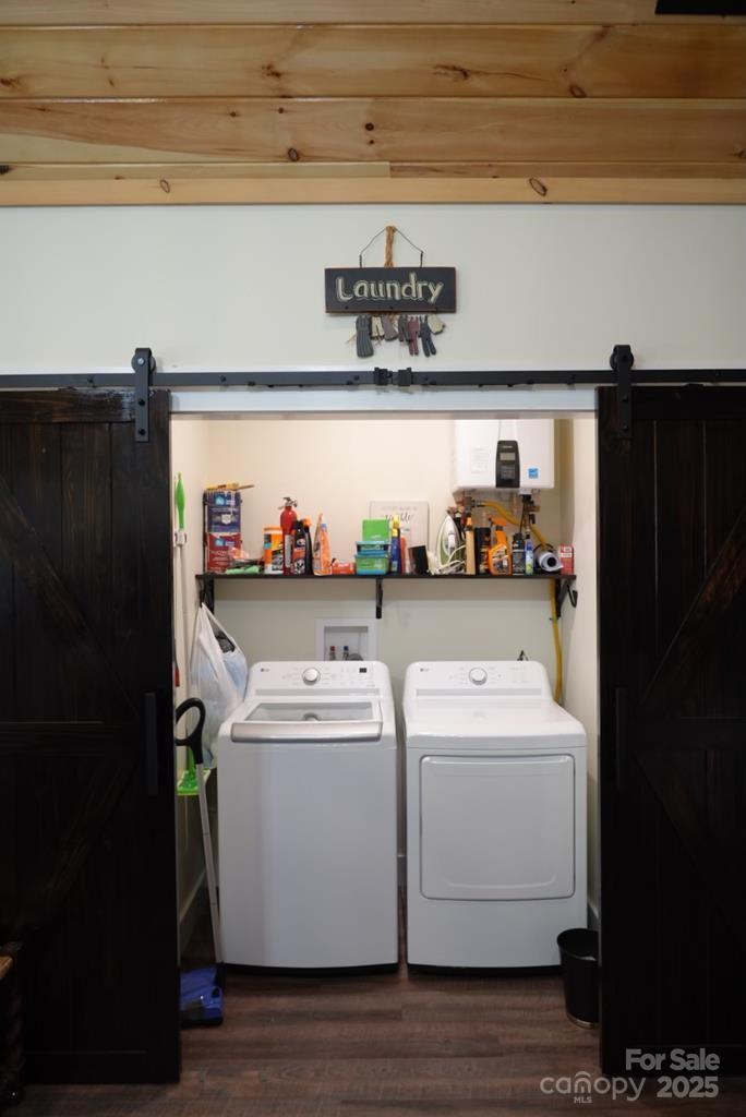 79 Abbey View Road Bryson City, NC 28713 - Photo 11 of 21 a utility room with dryer and washer
