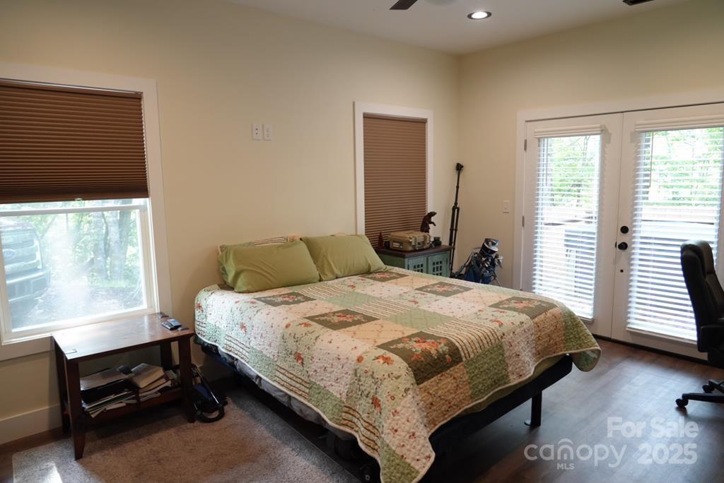 79 Abbey View Road Bryson City, NC 28713 - Photo 12 of 21 a bedroom with a bed and a window