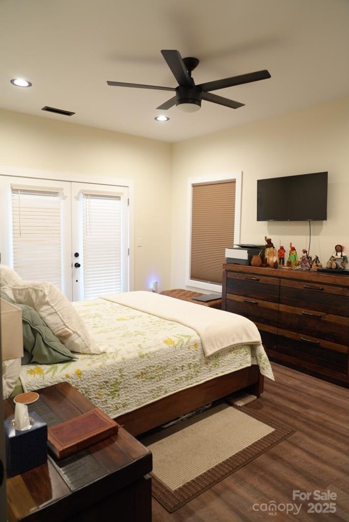 79 Abbey View Road Bryson City, NC 28713 - Photo 17 of 21 a bedroom with a bed and a flat screen tv