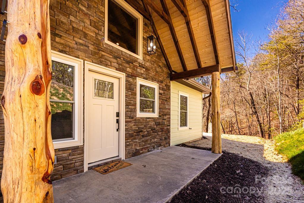 79 Abbey View Road Bryson City, NC 28713 - Photo 4 of 21 a view of an entrance of the house