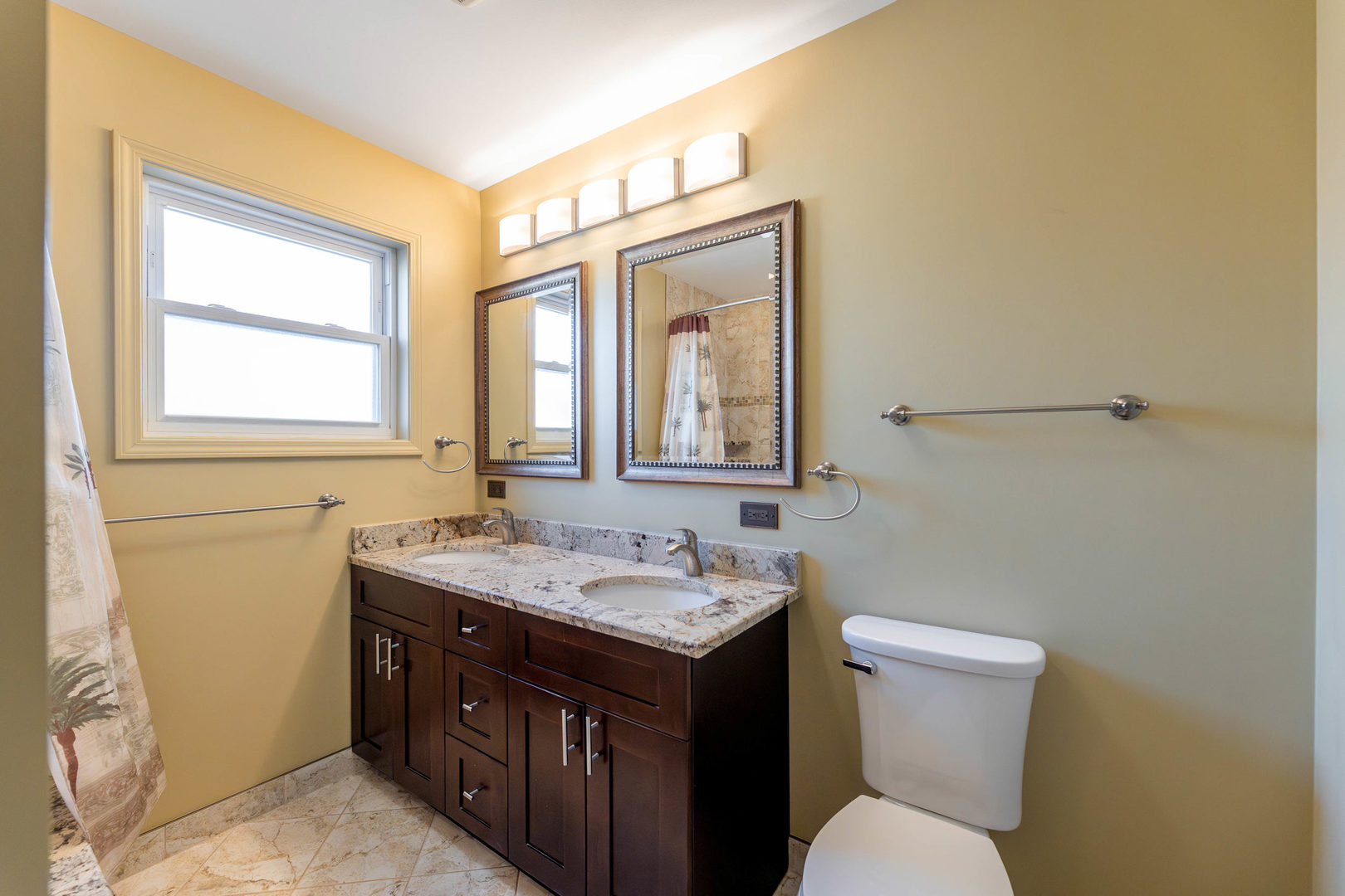7806 West 83rd Street Bridgeview, IL 60455 - Photo 20 of 53 a bathroom with a granite countertop sink toilet and mirror