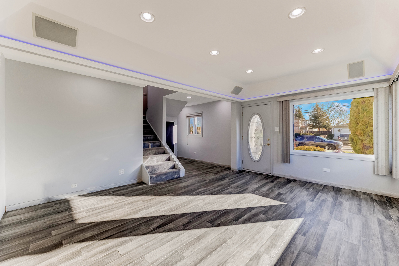 7806 West 83rd Street Bridgeview, IL 60455 - Photo 5 of 53 a view of a room with wooden floor and window