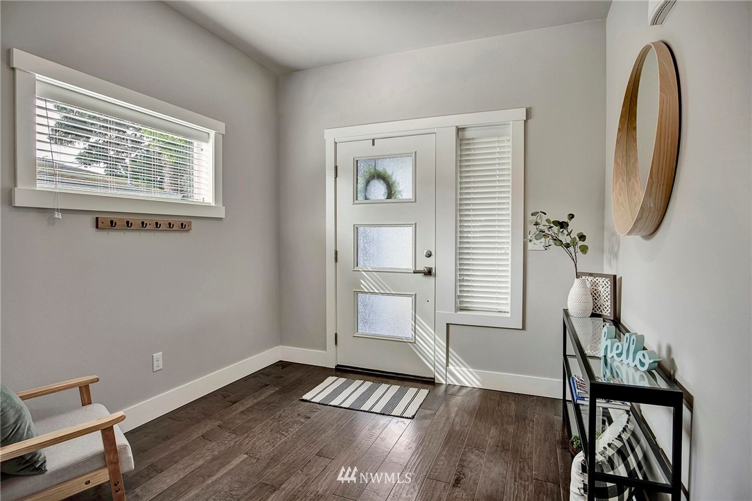 20403 South Danvers Road, Unit B Lynnwood, WA 98036 - Photo 4 of 29 a view of an entryway with wooden floor