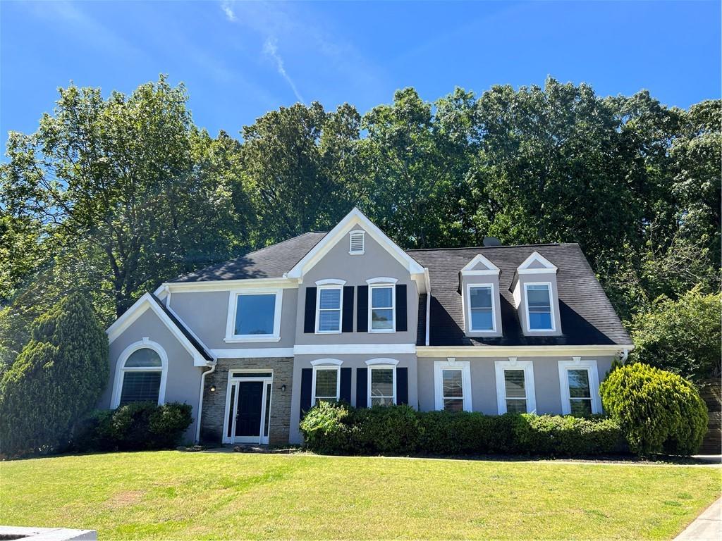 4109 Summit Crossing Drive Decatur, GA 30034 - Photo 1 of 1 a front view of a house with a garden