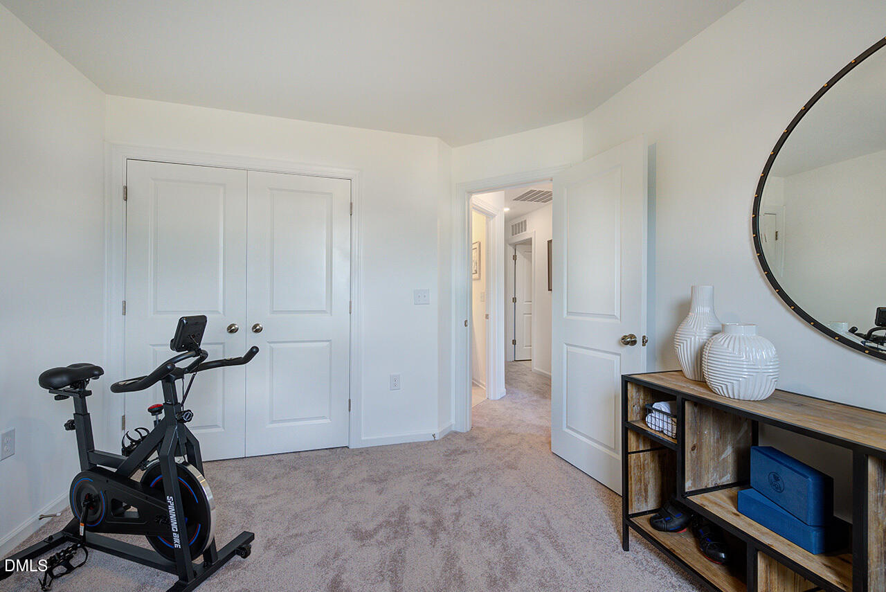 51 Shay Street Angier, NC 27501 - Photo 34 of 41 a view of a room with gym equipment