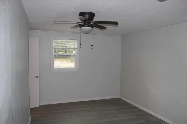 a view of a room that has a window in it