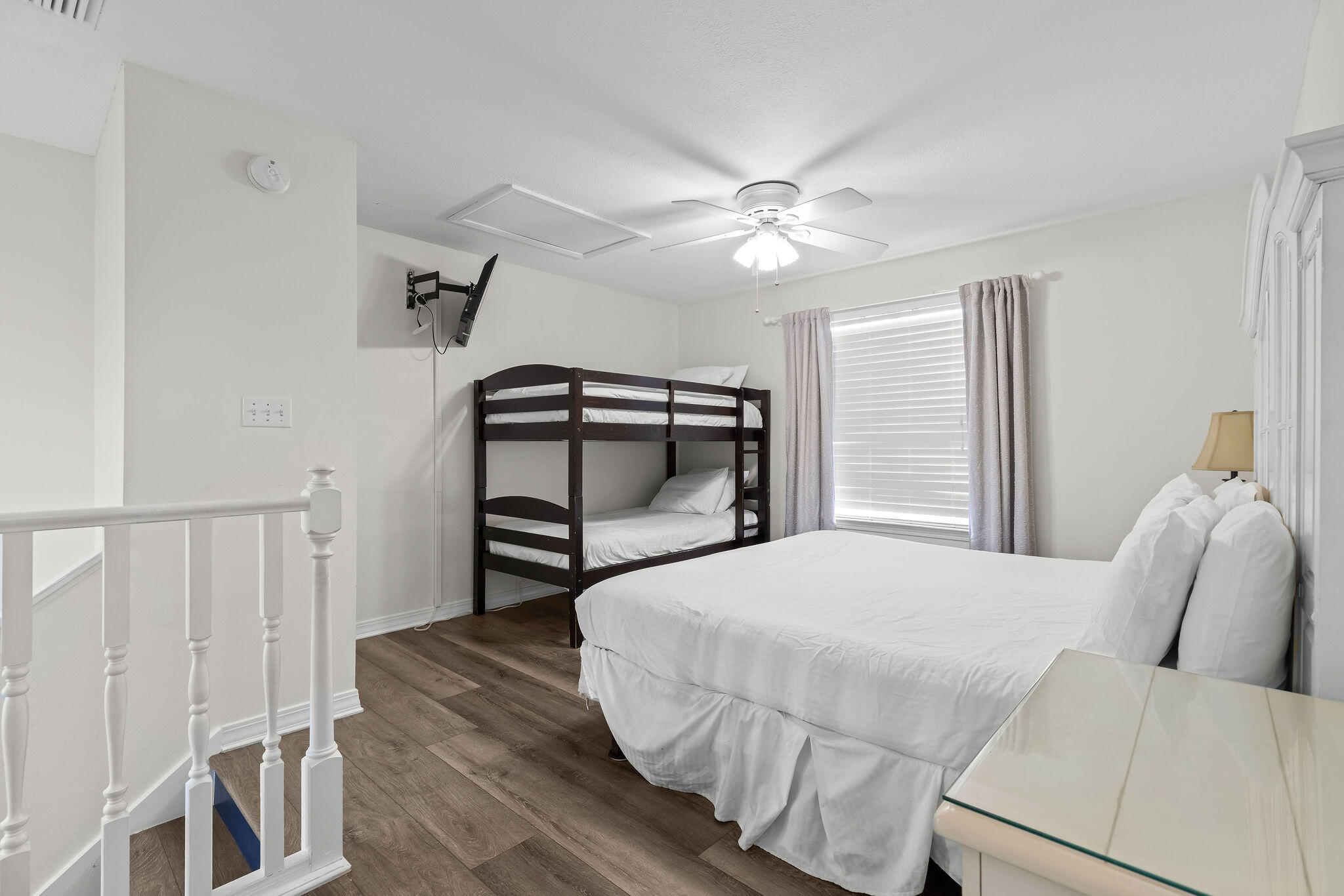 91 Matthew Boulevard Destin, FL 32541 - Photo 73 of 85 a bedroom with a bed and a chandelier