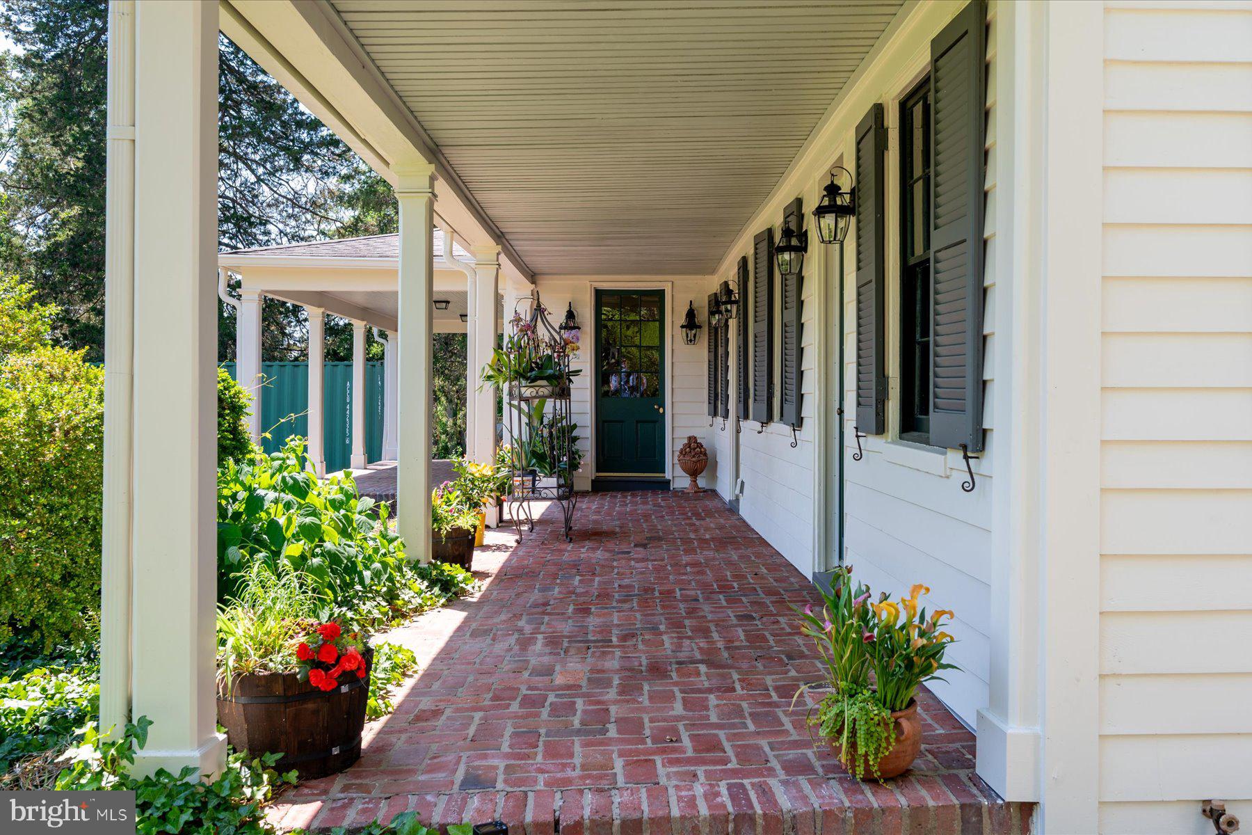 5503 Brooks Woods Road Lothian, MD 20711 - Photo 65 of 99 a porch with seating space