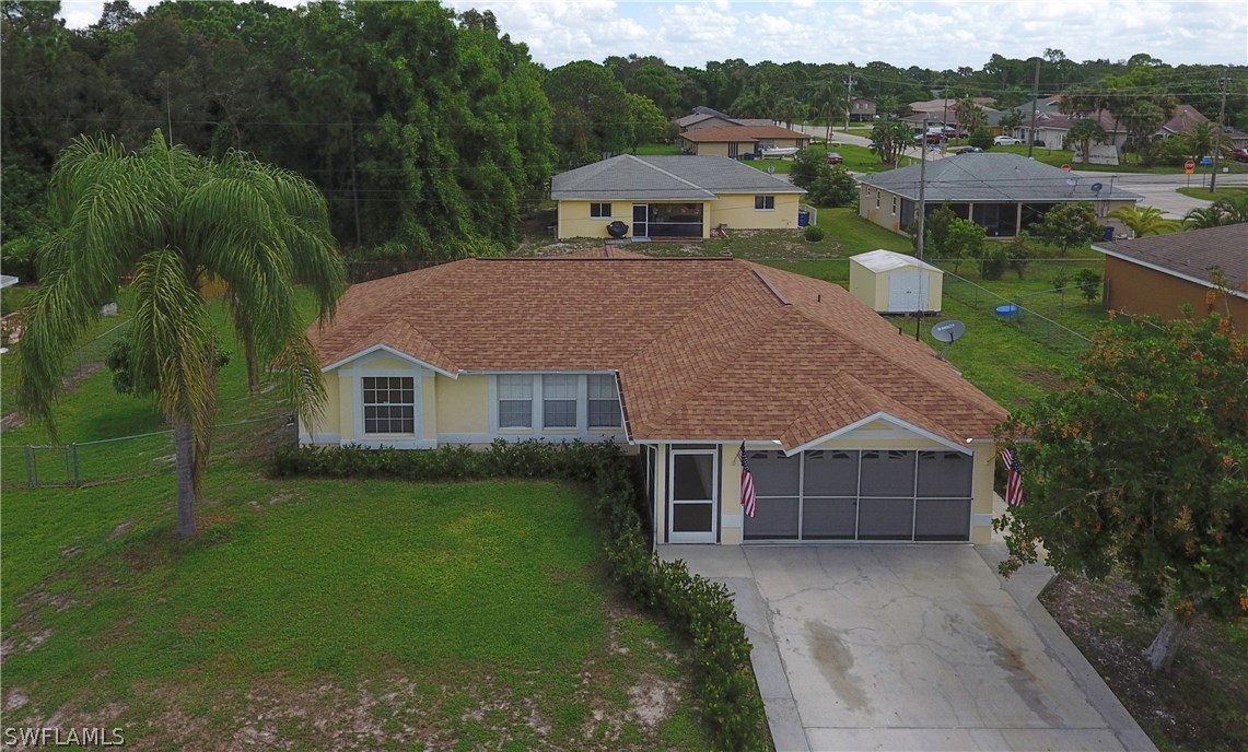 8461 Bamboo Road Fort Myers, FL 33967 - Photo 8 of 22 a aerial view of a house next to a yard