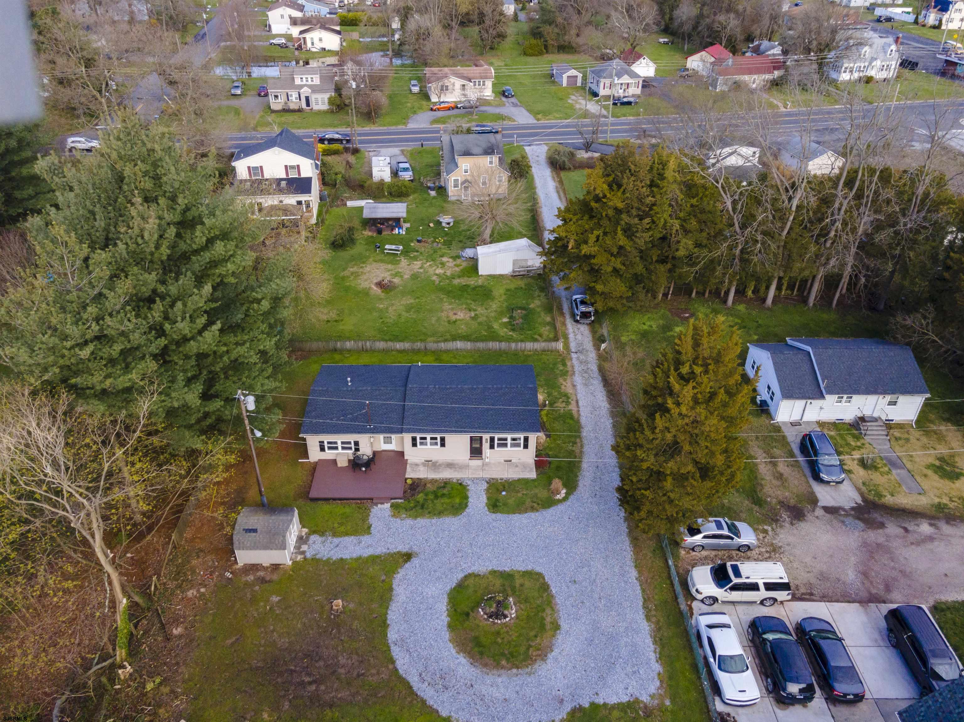 100 North Hook Road Pennsville, NJ 08070 - Photo 3 of 24 an aerial view of residential house with outdoor space