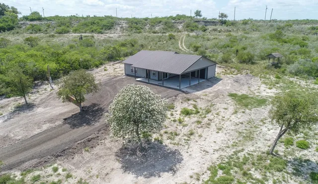 a view of a yard in front of a house