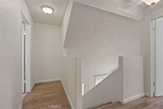a view of hallway with stairs