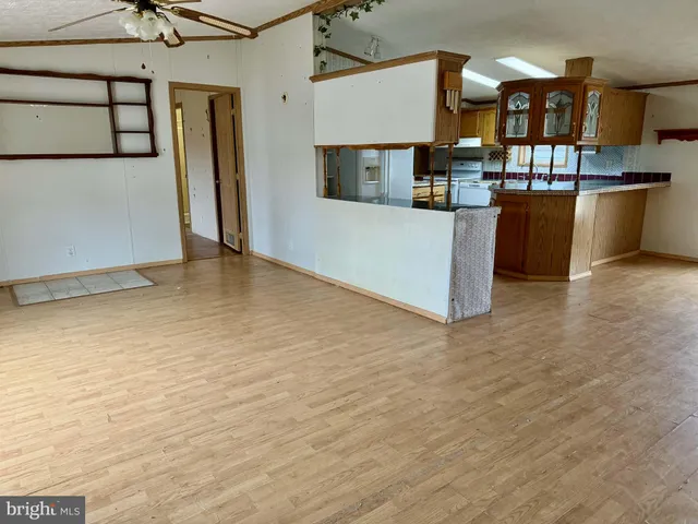 a view of a kitchen with a sink